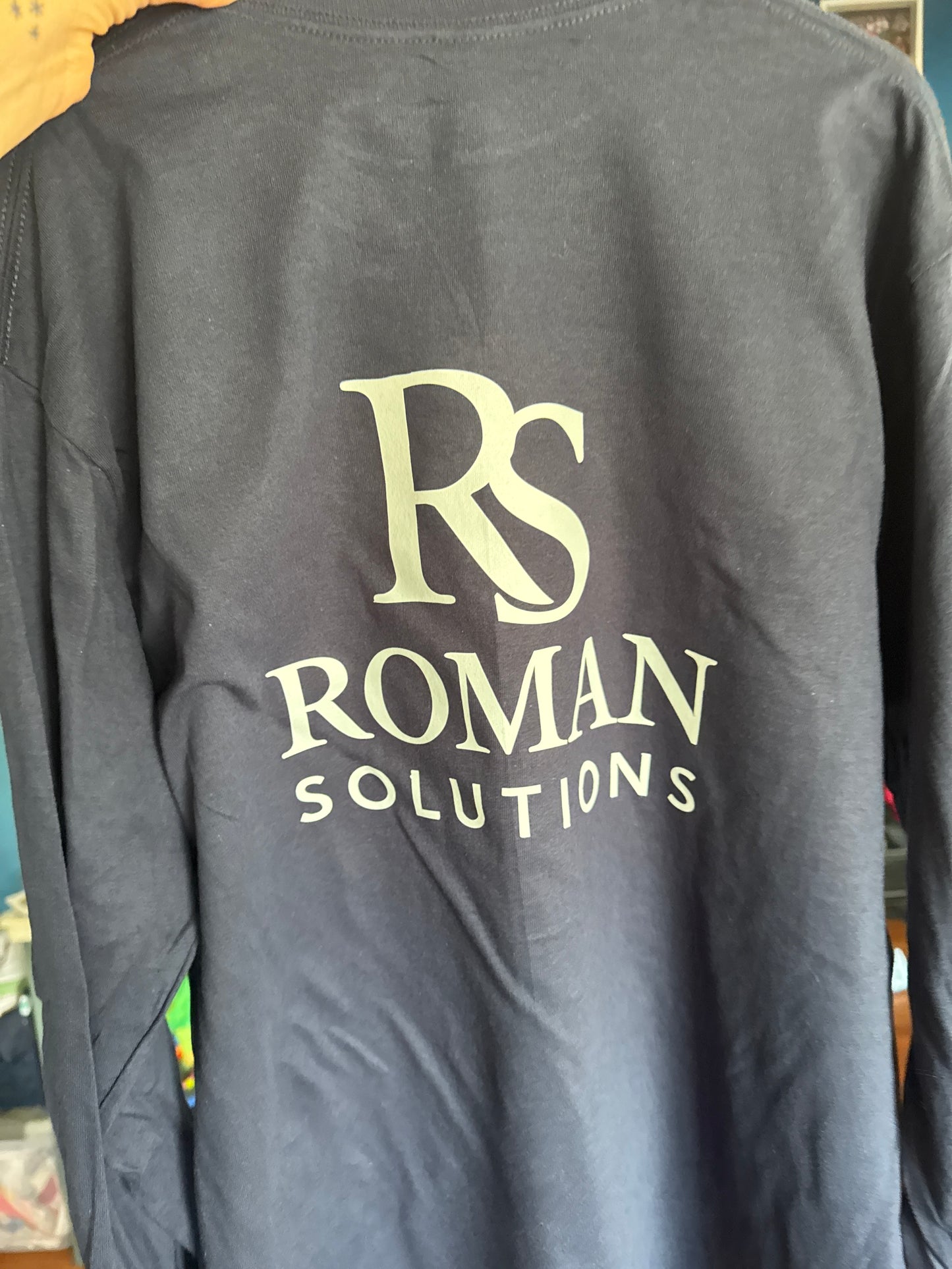 Roman Solution shirts